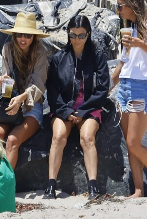 Kim Kardashian - With Kourtney  seen at the beach in Malibu for a birthday party